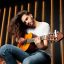 Talented Latin Guy Playing Guitar Sitting In Dark Black Studio